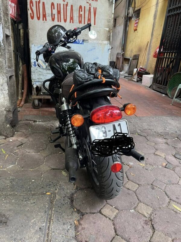 Tay xach doi triumph 9